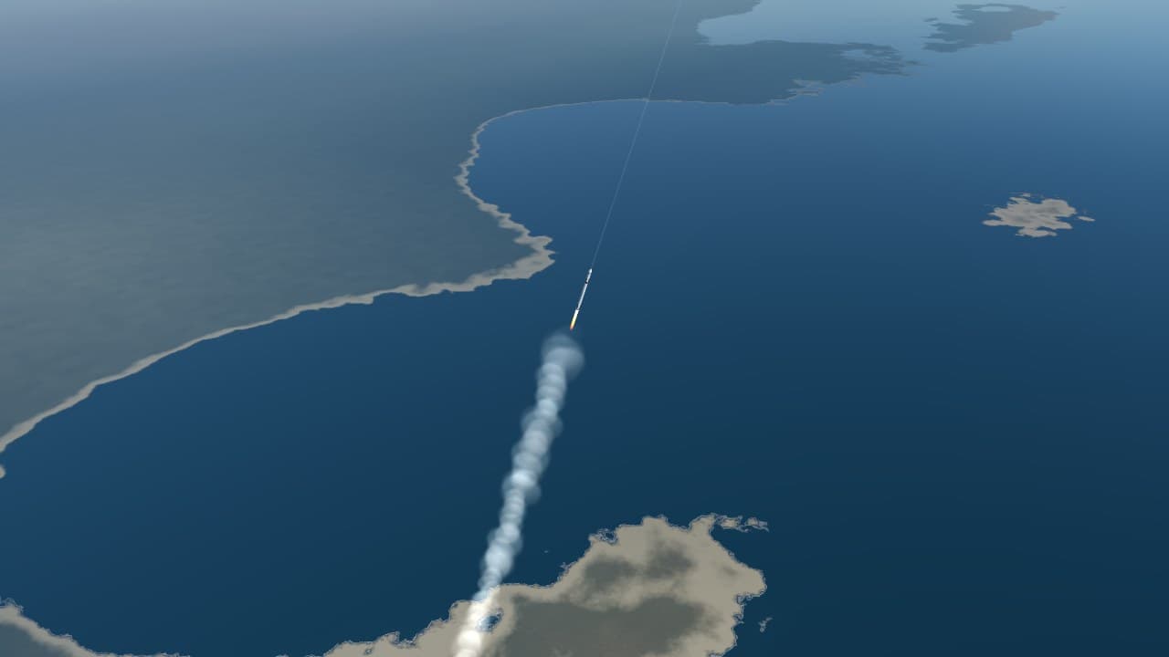 A launch vehicle climbing away from the Texas Gulf coast, its exhaust trail below it and the coastline laid out underneath